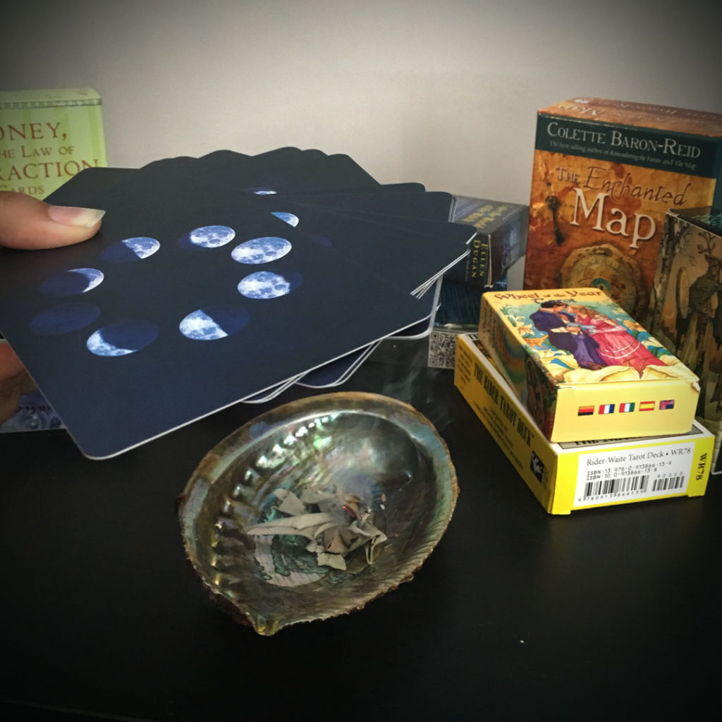 When you bring home new tarot cards, you will want to cleanse your tarot cards to remove the energies from those who held them before you. 